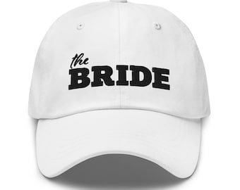 The Bride Hat white with high quality black embroidery to compliment The Groom Hat listing. Adjustable brass buckle strap and Wedding gift.