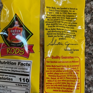 May include: A yellow bag of Better Made potato chips with the words "Better Made" and "Special Rods" in red and black lettering. The bag has a nutrition facts label and a quality guarantee statement. The statement includes the company's address and a phone number for customer service.