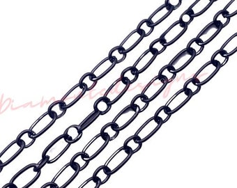 May include: Four strands of black metal chain with oval links. The chain is a popular material for jewelry making and crafting.