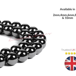 Peut inclure: Un brin de perles d'hématite noire. Les perles sont rondes et lisses. Tailles disponibles : 2 mm, 4 mm, 6 mm, 8 mm et 10 mm. Vendeur britannique de confiance.