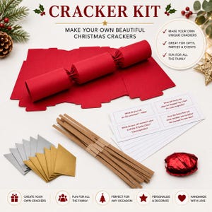 May include: A Christmas cracker kit featuring red cardboard templates, brown paper strips, silver and gold foil accents, and a sheet of printed jokes. The text reads CRACKER KIT, MAKE YOUR OWN BEAUTIFUL CHRISTMAS CRACKERS, and includes various holiday-themed jokes.