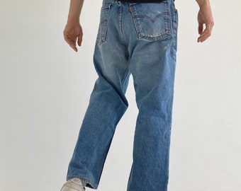 levis 615 orange tab