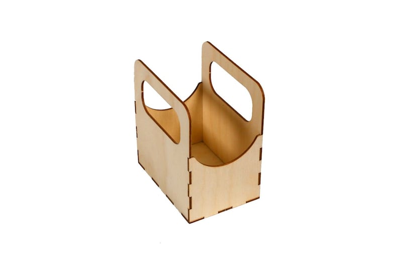 May include: A wooden box with a handle, perfect for carrying small items. The box is made of light brown wood and has a simple design.
