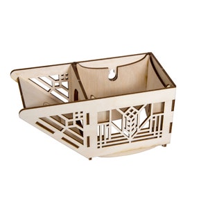 May include: A wooden box with a geometric design, open to reveal the interior. The box is made of light wood and has a natural finish.