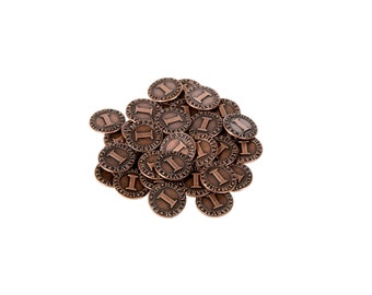 May include: A pile of copper-coloured metal game tokens with the Roman numeral 'I' on each token.
