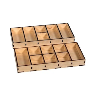 May include: Two-tiered wooden organizer with multiple compartments. The top tier has three long compartments and one square compartment. The bottom tier has nine square compartments.