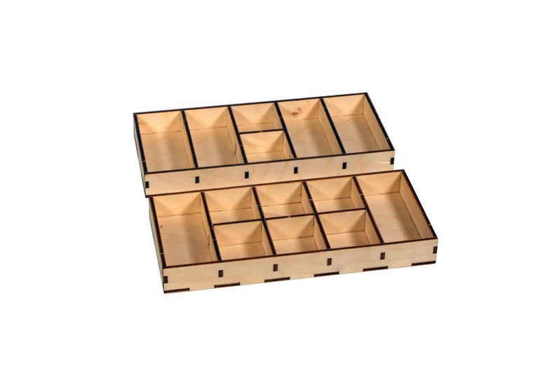 May include: Two-tiered wooden organizer with multiple compartments. The top tier has three long compartments and one square compartment. The bottom tier has nine square compartments.
