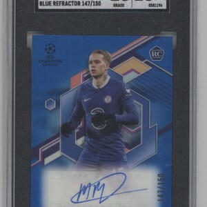 May include: A blue, white, and orange trading card featuring a soccer player in a blue jersey with the text "Mykhailo Mudryk" and "Chelsea FC". The card is numbered 147/150 and has a blue refractor finish.