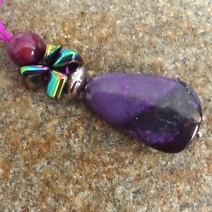 Rare Sugilite, 1A quality, Sugilite pendant with macrame cord.