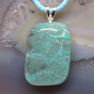 Quantum Quatro , chrysocolla with chain , exceptional and rarely offered stone