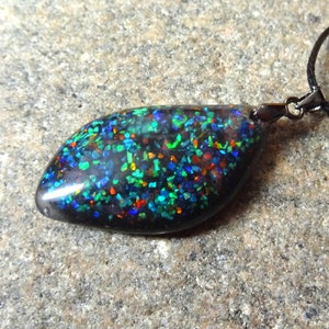 Beautiful colorful unique pendant with opal.