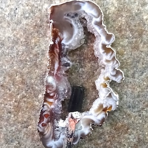flamed agate geode with tourmaline, agate pendant with tourmaline crystal, silver-plated