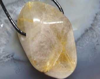 Rutilated quartz, rutilated quartz pendant, rutilated quartz on a chain