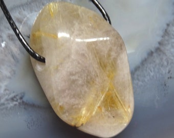 Rutilated quartz, rutilated quartz pendant, rutilated quartz on the chain