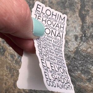 May include: White sticker with black text listing different names for God in Hebrew and English. The names include Elohim, Jehovah, El Elyon, El Shaddai, and God Almighty.