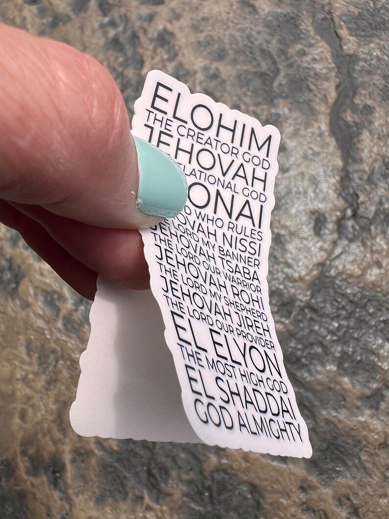 May include: White sticker with black text listing different names for God in Hebrew and English. The names include Elohim, Jehovah, El Elyon, El Shaddai, and God Almighty.
