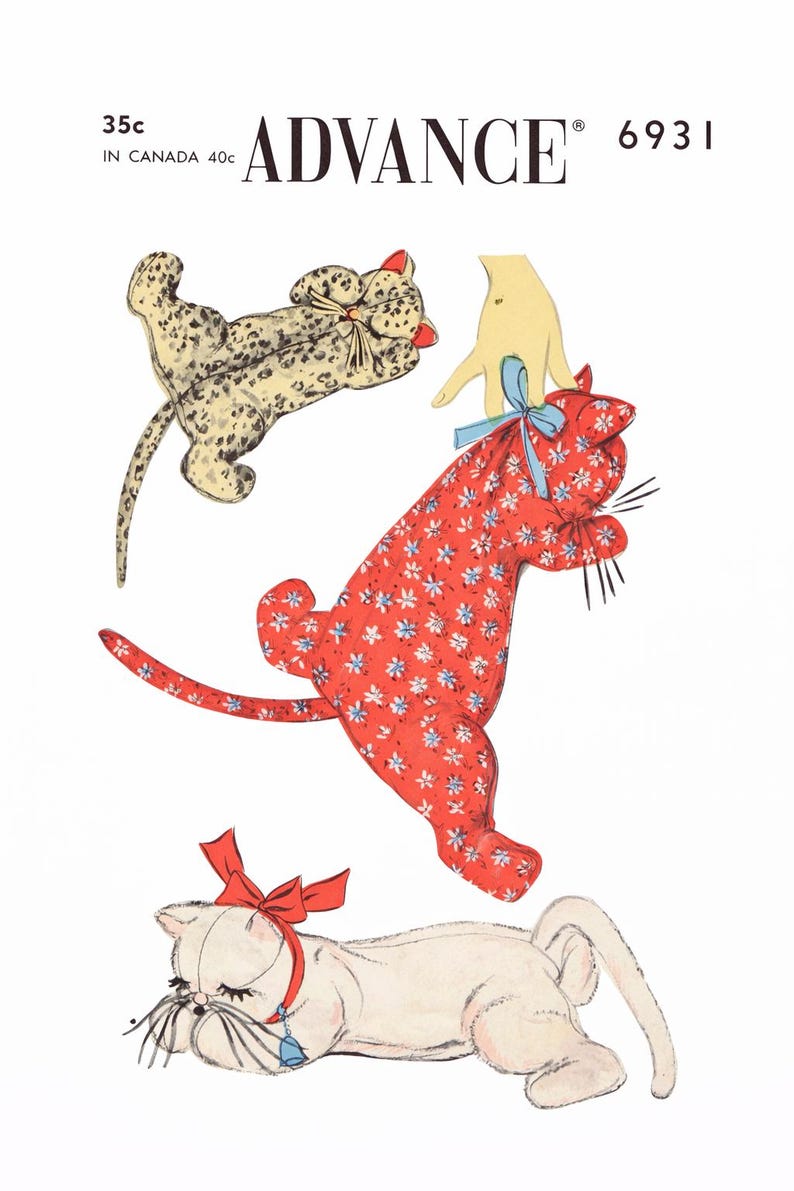 May include: Vintage sewing pattern featuring three cat-shaped stuffed toys. The cats are in various poses and made from patterned fabrics, including a spotted beige, a red floral, and a cream-colored fabric. The pattern is labeled "ADVANCE 6931".