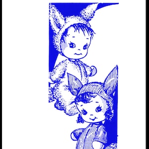 May include: A vintage sewing pattern for two blue bunny dolls. The pattern is called "Design 634".
