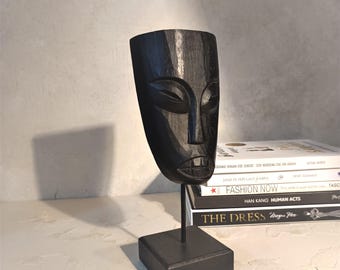 Hand-Carved Black Tribal Mask: Minimalist Wooden Sculpture on Stand