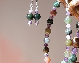 A natural stone jewelry set made of fancy jasper and amethyst beads.