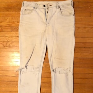 80s / 90s Levi’s 631 Orange Tab - white denim vintage men’s jeans size 34x30