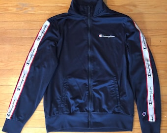 90s / 2000s Champion brand classic navy blue white and red sport vintage zip up jacket with sleeve stripe
