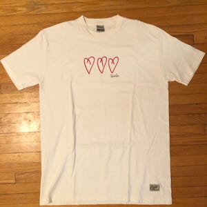 Camiseta vintage de punto sencillo con raíces de los 90
