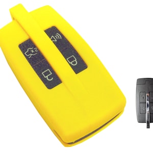 May include: A bright yellow silicone key fob cover for a car key. The cover has buttons for lock, unlock, and trunk release. The cover is designed to protect the key from scratches and damage.