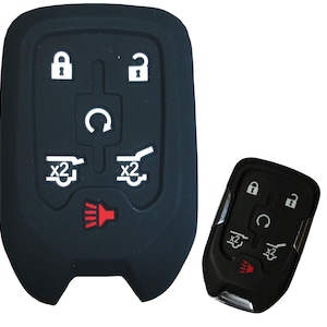 May include: Black silicone key fob cover with white buttons for a car key. The cover has buttons for lock, unlock, trunk release, and panic. The cover also has a red LED light.