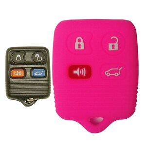 May include: A pink silicone key fob cover for a car key with four buttons. The buttons on the cover are for lock, unlock, trunk release, and panic.