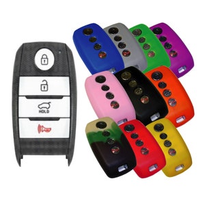 May include: A set of 10 silicone key covers for car key fobs. The covers are in various colors, including blue, pink, black, green, red, and yellow. The covers are designed to protect the key fob from scratches and wear.