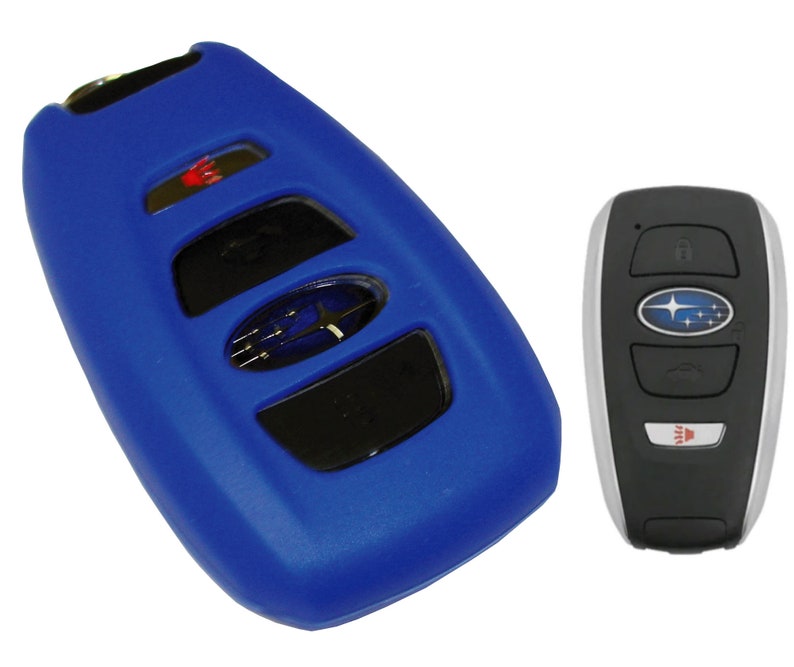 May include: A blue silicone key fob cover for a Subaru car key. The key fob has four buttons and a Subaru logo. The key fob is shown next to a silver and black car key.