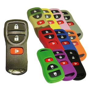 May include: A set of ten silicone key covers for car key fobs. The covers are in various colors, including camouflage, yellow, pink, gray, red, blue, orange, green, purple, and black.
