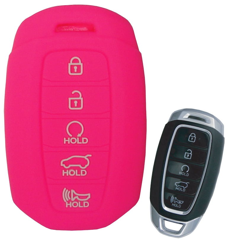 Puede incluir: Funda de silicona rosa para llave de coche con cinco botones. Los botones tienen iconos para bloquear, desbloquear, abrir el maletero, p&aacute;nico y mantener. La funda de la llave est&aacute; dise&ntilde;ada para proteger la llave de ara&ntilde;azos y suciedad.