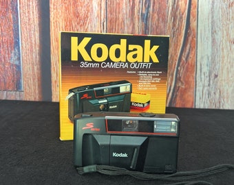 Cámara Kodak de 35 mm, modelo S100EF - Sin probar / No incluye película ni pilas.