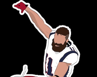 May include: Illustration of a football player in a white, navy blue, and red uniform, holding a helmet. The player is depicted with a beard and is in a dynamic pose with one arm raised. The background is solid black.