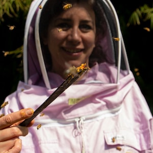 Sara showing bee propolis collected from the hive