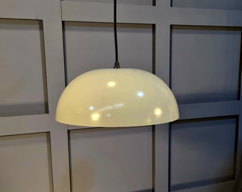 Metal 300mm Pendant in Grey Gloss with a captivating Cream-toned interior, perfect for enhancing your dining table lighting.