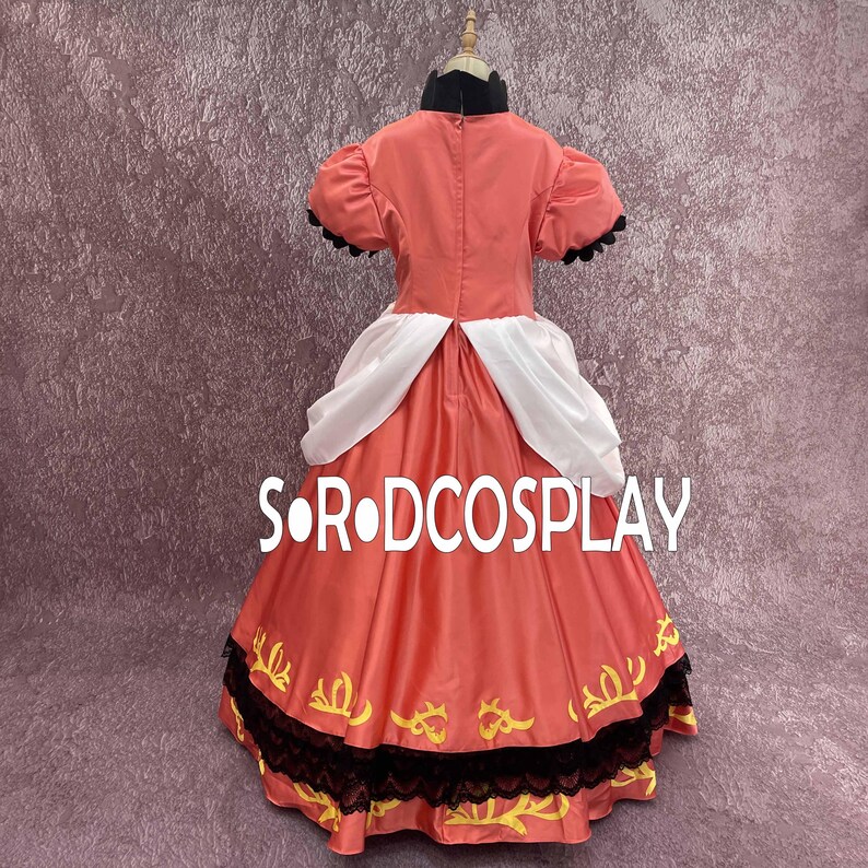 May include: A coral-colored cosplay dress with short, puffed sleeves and a black collar. The dress features white accents and a skirt with gold and black trim. The text "S&bull;R&bull;DCOSPLAY" is visible on the skirt.