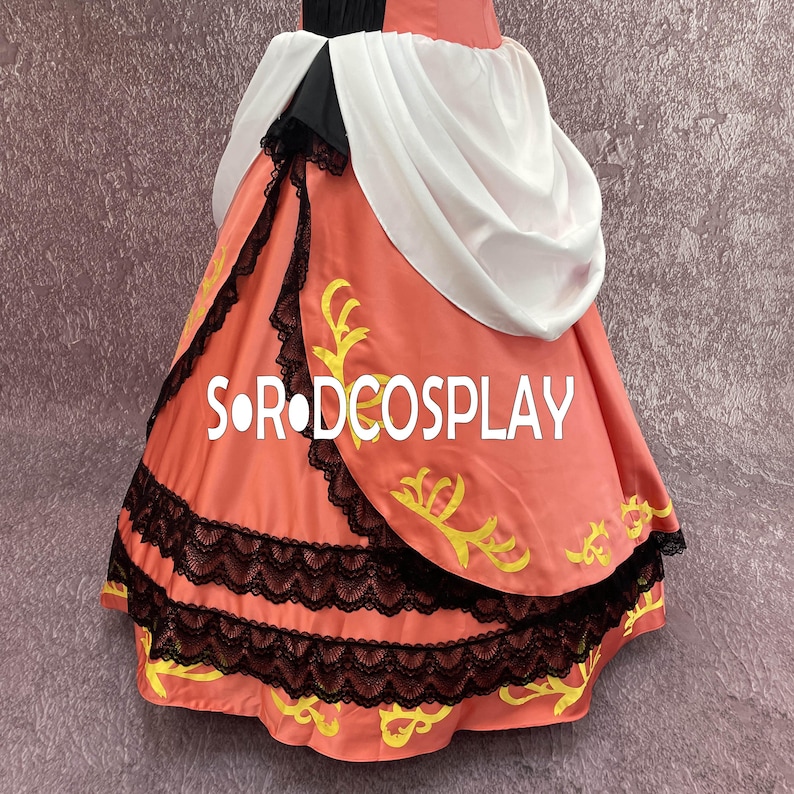 May include: A coral-colored dress with black lace trim and yellow floral accents. The dress features a white and black bodice and a flowing skirt. The text "SORODCOSPLAY" is printed on the skirt.
