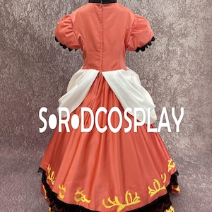 May include: A coral-colored cosplay dress with a black collar and puff sleeves. The dress features white accents and a full skirt with yellow floral embroidery and black lace trim. The text "S OR DCOSPLAY" is visible on the skirt.