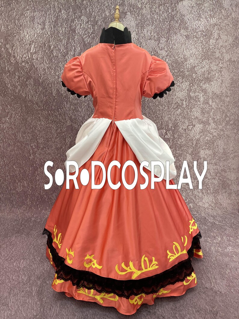 May include: A coral-colored cosplay dress with a black collar and puff sleeves. The dress features white accents and a full skirt with yellow floral embroidery and black lace trim. The text "S OR DCOSPLAY" is visible on the skirt.