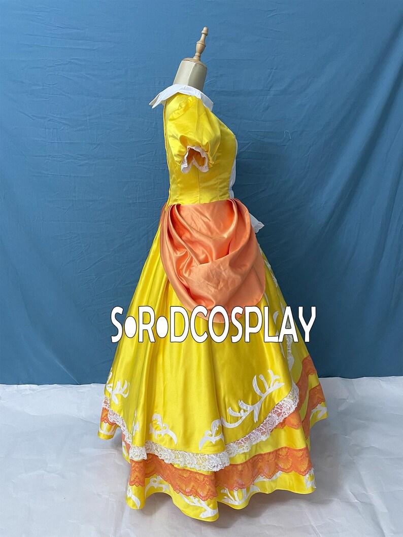 May include: A yellow satin dress with white lace trim and an orange sash. The dress features short sleeves, a white collar, and the text "SORODCOSPLAY" in white across the skirt. The dress is displayed on a mannequin.