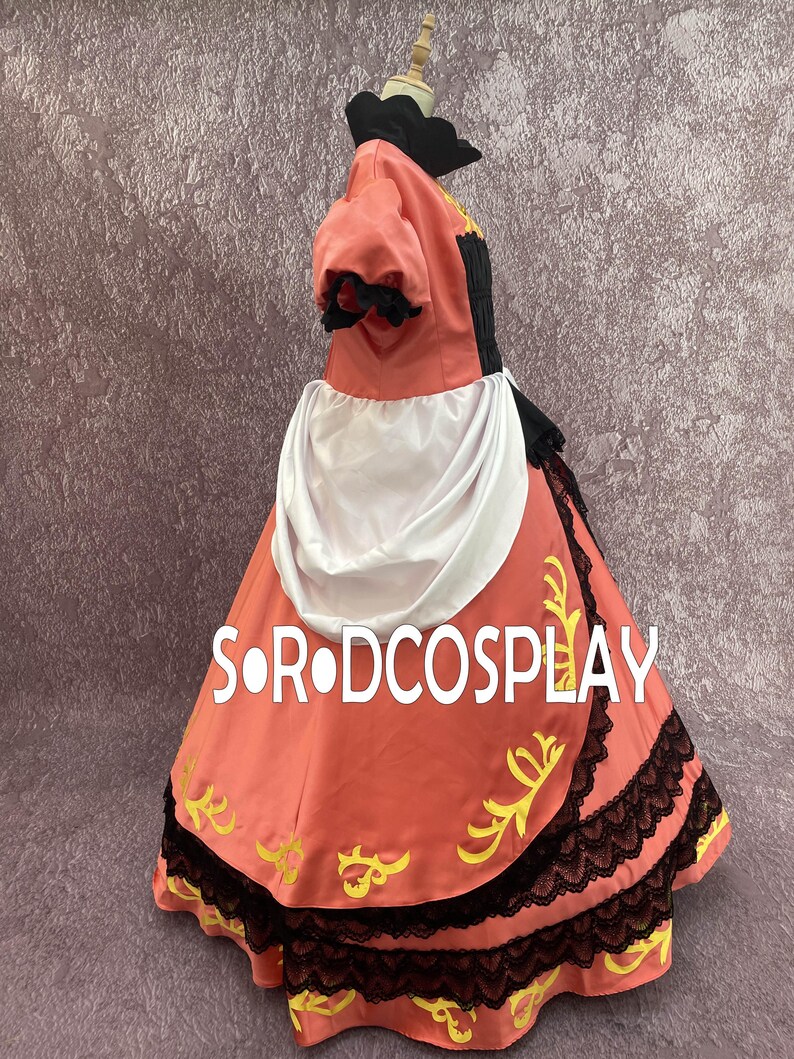 May include: A coral-colored cosplay dress with black lace trim and gold accents. The dress features a high collar, puffed sleeves, and a white apron-like detail. The text "S.OR.DCOSPLAY" is printed on the skirt.