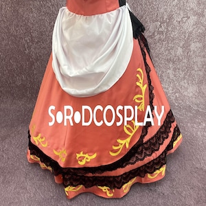 May include: A coral-colored costume skirt with black lace trim and yellow floral accents. The skirt features the text "S O R DCOSPLAY" in white. A white draped fabric is visible at the top of the skirt.