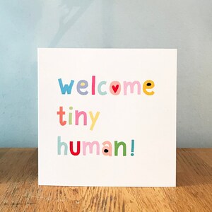 Tarjeta de felicitación humana de bienvenida