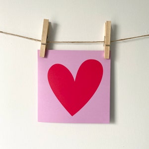 Carte de voeux rouge rose d’amour de coeur