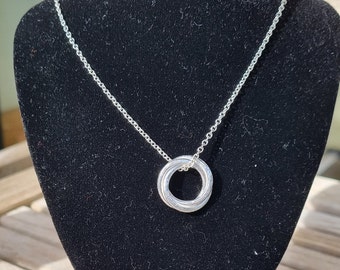 Argentium Silver pendant, Argentium Silver necklace, silver necklace, silver jewellery, mobius ring design, hammered texture, recycled metal