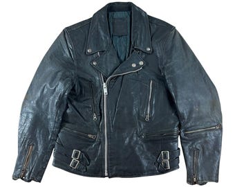 May include: A black leather biker jacket with a zip fastening and multiple pockets. The jacket has a distressed look and features silver hardware.
