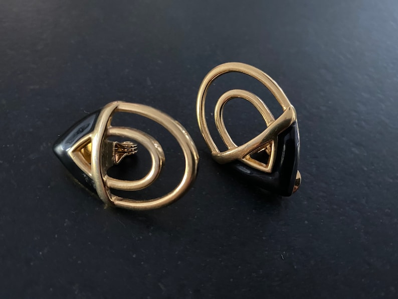 Signed Monet Abstract Gold Tone Earrings. Black Enamel Golden Metal Open Work Statement Earrings Vintage Monet Large Clip On Earrings